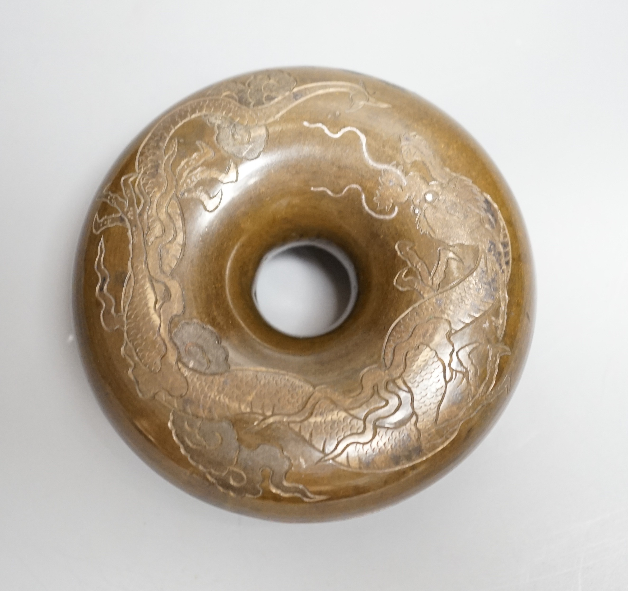 A Japanese silver inlaid bronze horse bell, Meiji period, diameter 9cm